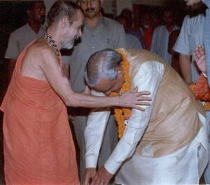 Sri Atal Bihari Vajpeyi, a seniour political leader, offering Pranams to Sri Swamiji